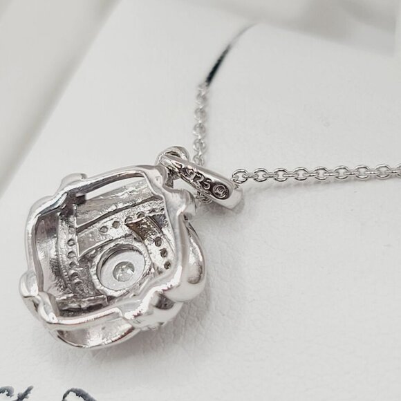 Sterling Silver 1/10 Carat T.W. Diamond Knot Pendant Necklace - Picture 3 of 7